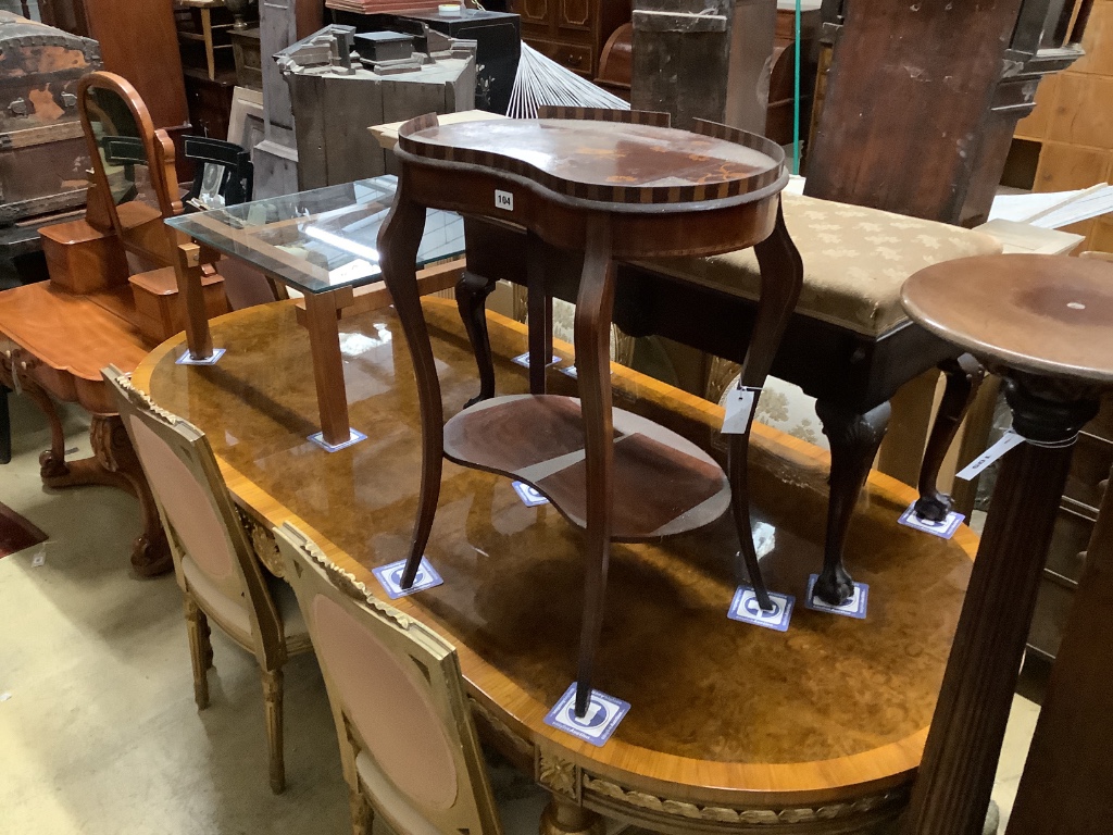 An Edwardian inlaid mahogany kidney shaped two tier table, width 58cm, depth 35cm, height 74cm